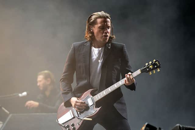Arctic Monkeys’ bass player Nicholas O’Malley performs on stage during the Rock-en-Seine music festival on August 22, 2014 in Saint-Cloud, near Paris. (Photo by BERTRAND GUAY/AFP via Getty Images)