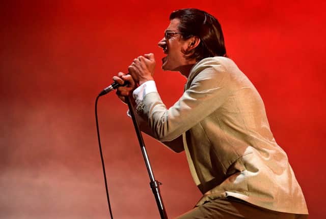 Alex Turner of the band Arctic Monkeys performs during the 12th Alive Music Festival in Oeiras, near Lisbon on July 12, 2018. (Photo by JOSE MANUEL RIBEIRO/AFP via Getty Images)