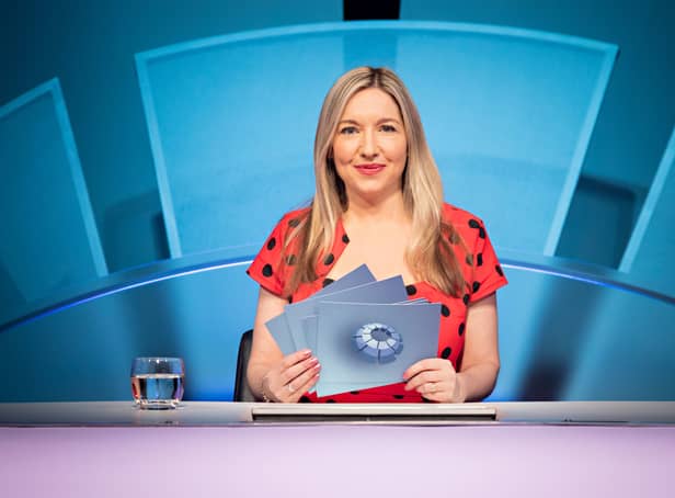 <p>Victoria Coren Mitchell, wearing a red polka dot dress, behind the desk presenting Only Connect (Credit: BBC/Parasol Media Limited/Rory Lindsay)</p>