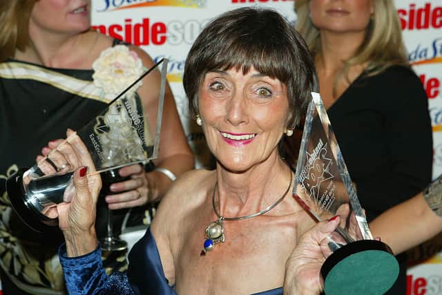 June Brown poses backstage during the “Inside Soap Awards Party” at La Rascasse, Cafe Grand Prix, September 27, 2004 in London (Photo by Gareth Cattermole/Getty Images)