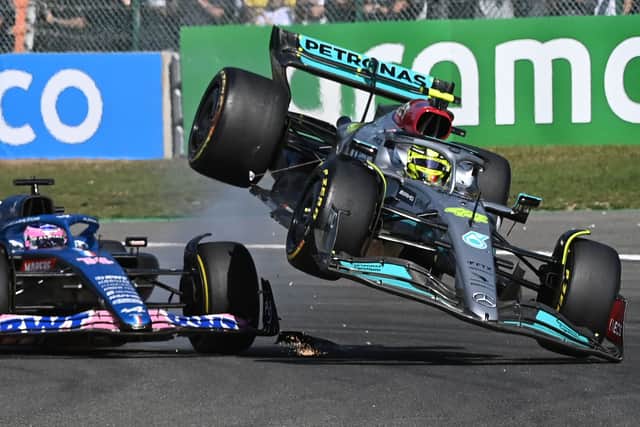 Lewis Hamilton collides with Fernando Alonso