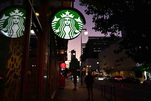 Starbucks has addressed rumours the coffee chain is going cashless in a statement (Pic: AFP via Getty Images)