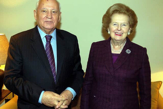 Mikhail Gorbachev stands with Lady Thatcher during a meeting in Lord Powell’s office in London in 2005. Credit: PA