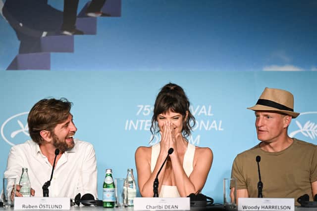 Swedish film director Ruben Ostlund, South African model and actress Charlbi Dean  and US actor Woody Harrelson attend a press conference for the film “Triangle of Sadness” (Pic: AFP via Getty Images)