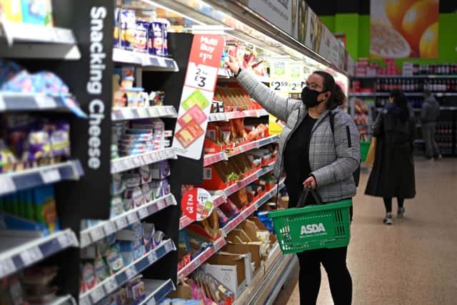 Asda has purchased 129 Co-op petrol station sites (image: AFP/Getty Images)