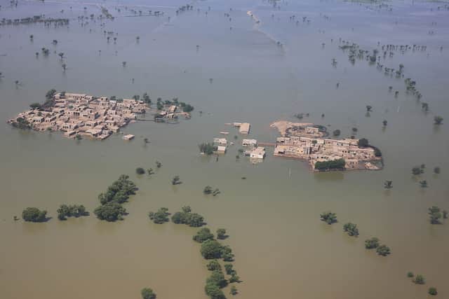 Residents in the Dadu district of the Sindh province have been urged to find higher ground ahead of peak floodwaters, which are expected by the end of the week (image: AFP/Getty Images)