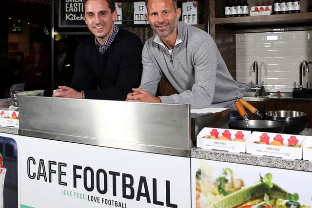 Gary Neville and Ryan Giggs pose during a Cook Off at Westfield Stratford City in 2013.