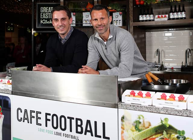 Gary Neville and Ryan Giggs pose during a Cook Off at Westfield Stratford City in 2013.