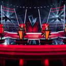 The Voice judges Olly Murs, Tom Jones, Anne-Marie and will.i.am sat in their revolving chairs, backs to the stage (Credit: ITV)