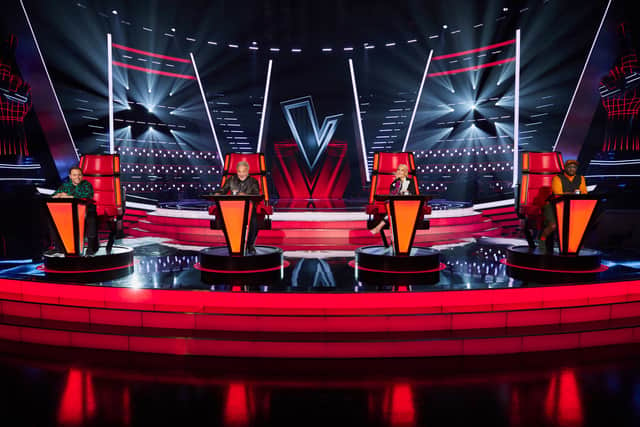 The Voice judges Olly Murs, Tom Jones, Anne-Marie and will.i.am sat in their revolving chairs, backs to the stage (Credit: ITV)