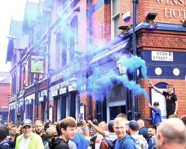LIVERPOOL, ENGLAND - SEPTEMBER 03: Fans of Everton enjoy the pre match atmosphere prior to the Premier League match between Everton FC and Liverpool FC at Goodison Park on September 03, 2022 in Liverpool, England. (Photo by Laurence Griffiths/Getty Images)