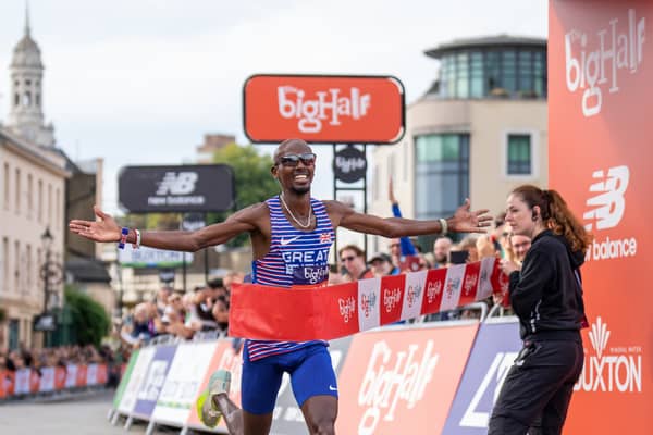 Sir Mo Farah crosses the finish line in Greenwich as he celebrates winning the Big Half for a third time (Credit: Official Big Half via Twitter)