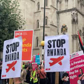 Demonstrators outside the Royal Courts of Justice, central London, protesting against the Government’s plan to send some asylum seekers to Rwanda.