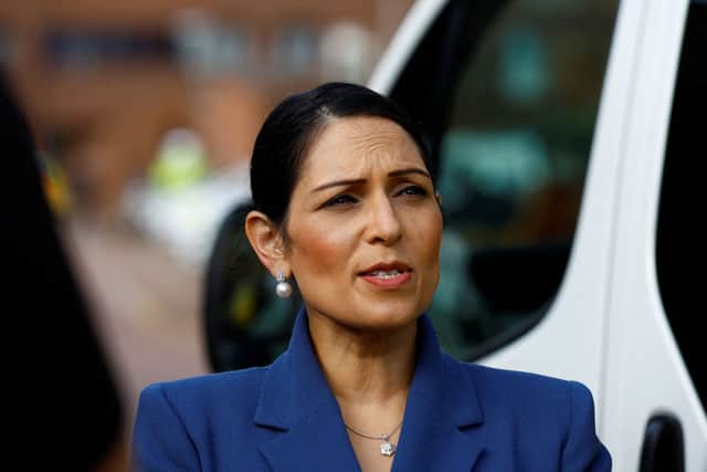 Priti Patel looks on during a visit with members of the Thames Valley Police, at Milton Keynes Police Station on August 31, 2022 in Milton Keynes, England (Photo by Andrew Boyers - WPA Pool/Getty Images)