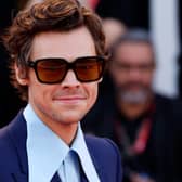 Fans are speculating that Harry Styles may have spit on Chris Pine. 