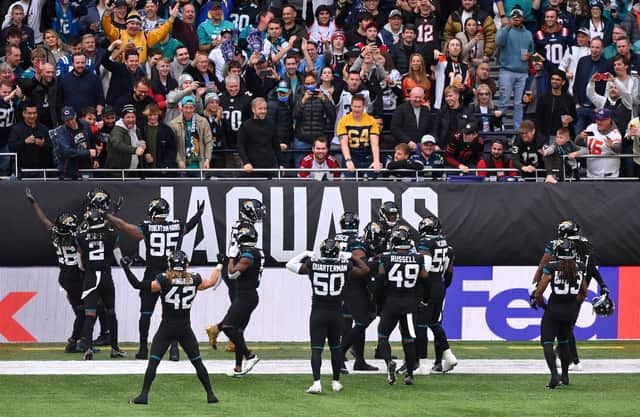 Jacksonville Jaguars celebrate during the NFL London 2021 match between Miami Dolphins and Jacksonville Jaguars at Tottenham Hotspur Stadium