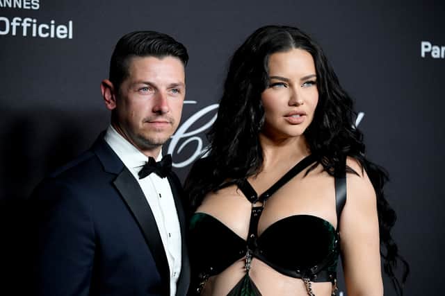 Andre Lemmers and Adriana Lima attend the 'Chopard Loves Cinema' gala dinner during the 75th Cannes Film Festival at Hotel Martinez on May 21, 2022
