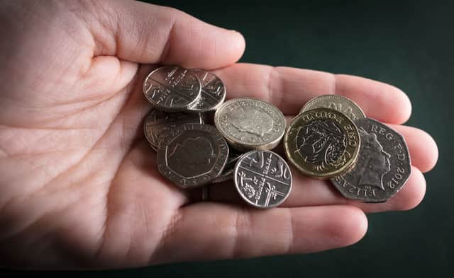 The cost of living crisis has seen people turn to physical money (image: Getty Images)