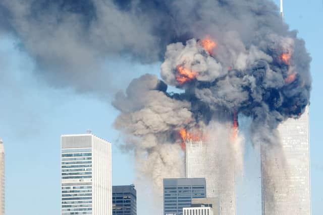  A fiery blast rocks the World Trade Centre after being hit by two planes September 11, 2001 in New York City.
