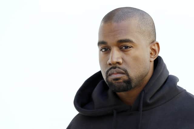 American rapper Kanye West poses before Christian Dior 2015-2016 fall/winter ready-to-wear collection fashion show on March 6, 2015 in Paris. (Photo credit: PATRICK KOVARIK/AFP via Getty Images)