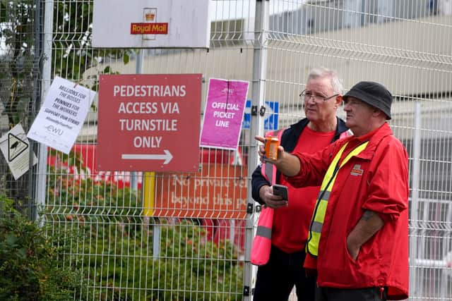 Royal Mail workers from the Communication Workers Union (CWU) on the picket line at the Glasgow Mail Centre (Photo: PA)