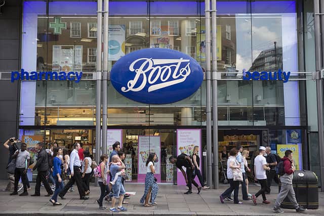 Members of the public walk past a branch of Boots the chemist on Oxford Street on August 6, 2014 in London, England  (Photo by Oli Scarff/Getty Images)