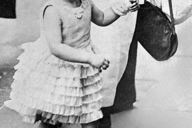 A four-year-old Princess Elizabeth of Great Britain is seen wearing a summer dress in 1930. Credit: Getty Images