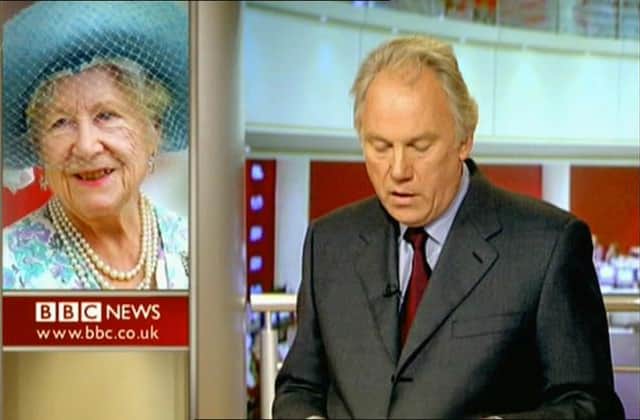 BBC newsreader Peter Sissons announcing the death of the Queen Mother in 2002, wearing a red tie (Credit: BBC News)