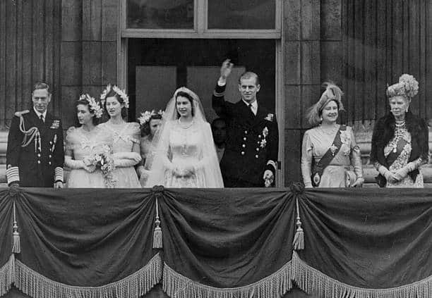 The Queen and Prince Philip gather on the famous balcony after their wedding (Pic:Getty)
