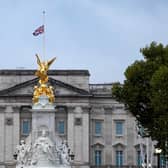 The Union flag flies at half-mast over Buckingham Palace following the death of the Queen