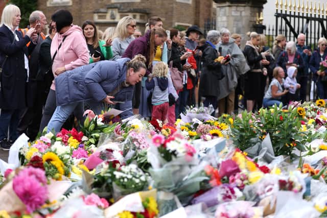 Mourners leave tributes at Windsor Castle