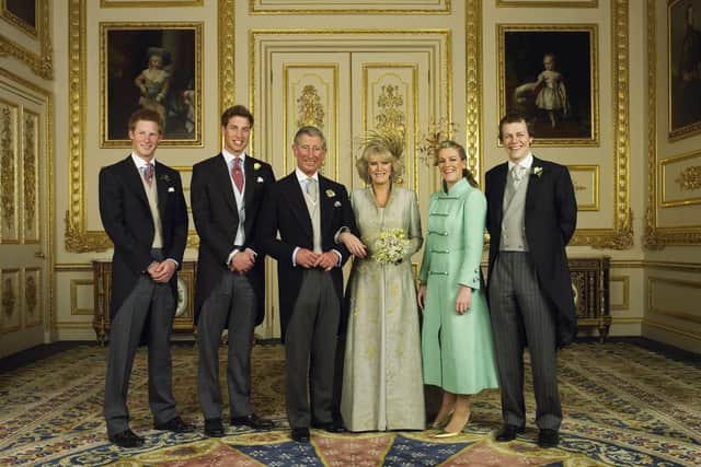 Clarence House official handout photo of the Prince of Wales and his new bride Camilla, Duchess of Cornwall, with their children (L-R) Prince Harry, Prince William, Laura and Tom Parker Bowles, in the White Drawing Room at Windsor Castle after their wedding ceremony April 9 2005, in Windsor, England. (Photo by Hugo Burnand/Pool/Getty Images) 