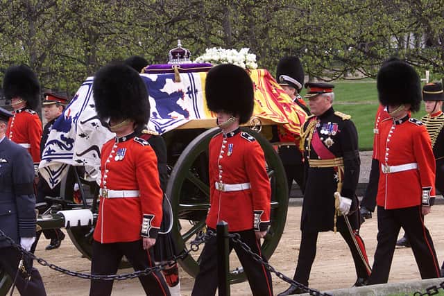 The Queen’s coffin, much like her mother’s (pictured), will lie in rest for the public to pay respects ahead of her final resting. (Credit: Getty Images)