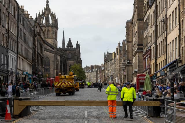 Preparations are underway at St Giles Cathedral to receive the coffin of Queen Elizabeth II, where she will lie in state for 24 hours, on September 9th 2022 in Edinburgh, Scotland. Elizabeth Alexandra Mary Windsor was born in Bruton Street, Mayfair, London on 21 April 1926. She married Prince Philip in 1947 and acceded the throne of the United Kingdom and Commonwealth on 6 February 1952 after the death of her Father, King George VI. Queen Elizabeth II died at Balmoral Castle in Scotland on September 8, 2022, and is succeeded by her eldest son, King Charles III. (Photo by Robert Perry/Getty Images)