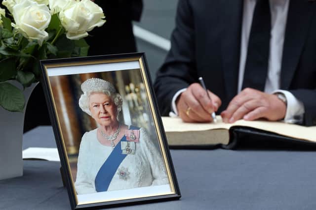 The German President signs a book of condolence at the British Embassy in Berlin (Pic: POOL/AFP via Getty Images)