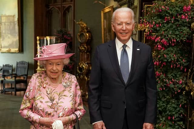 Queen Elizabeth II with US President Joe Biden during their visit to Windsor Castle on June 13, 2021. (Photo by Steve Parsons - WPA Pool/Getty Images)