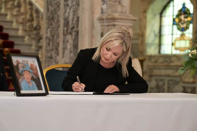  Sinn Fein’s Michelle O’Neill signs a book of condolence at Belfast City Hall (Pic: Getty Images)