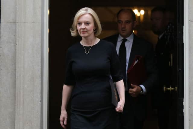 Liz Truss insists her energy crisis plan will still be implemented (image: AFP/Getty Images)