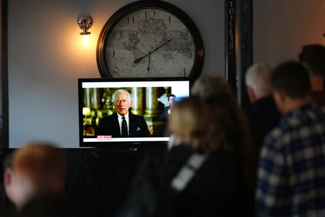 People in The Prince Harry Pub, Windsor, watching a broadcast of King Charles III first address to the nation as the new King (Image: PA)