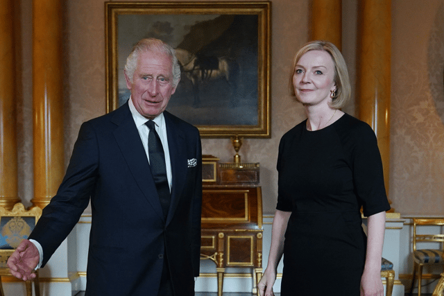 Prime Minister Liz Truss is set to join King Charles III on a mourning tour of the UK, following the death of Queen Elizabeth II. (Credit: Getty Images)
