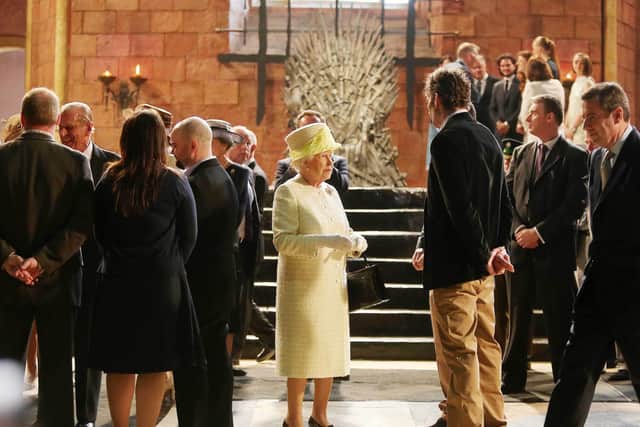 Queen Elizabeth II meets some of the actors from the show, in the Throne Room on-set (Photo by Jonathan Porter - Pool/Getty Images)