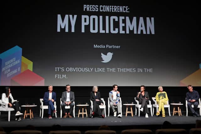 (L-R) Guest, Linus Roache, Rupert Everett, Gina McKee, David Dawson, Harry Styles,  Emma Corrin and Michael Grandage speak onstage at the "My Policeman" Press Conference during the 2022 Toronto International Film Festival at TIFF Bell Lightbox on September 11, 2022 in Toronto, Ontario. (Photo by Matt Winkelmeyer/Getty Images)
