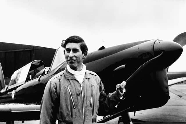 Prince Charles standing next to a Chipmunk training aircraft during one of his flying lessons, August 1969. (Photo by Fox Photos/Hulton Archive/Getty Images)