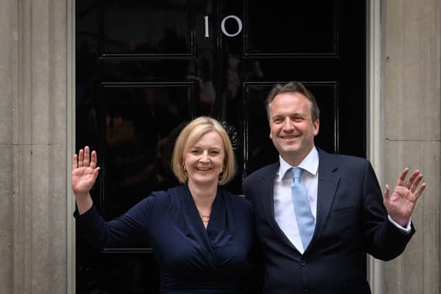 New UK prime minister Liz Truss with her husband Hugh O’Leary outside 10 Downing Street (Pic: Getty Images)