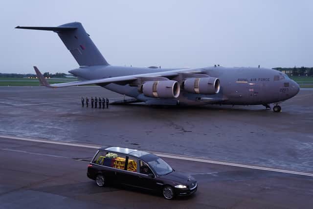 The coffin of Queen Elizabeth II was transferred by the Royal hearse, after leaving the RAF aircraft at RAF Northolt (Photo by Andrew Matthews - WPA Pool/Getty Images)