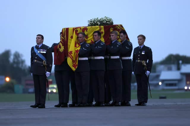 The Queen’s coffin is carried to the Royal Hearse after landing in London (Pic: Getty Images)