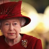 The Queen will be buried with her wedding band and a pair of pearl earrings. 