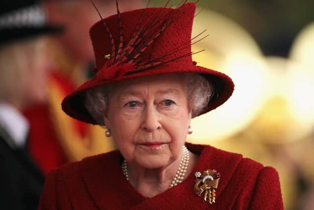 The Queen will be buried with her wedding band and a pair of pearl earrings. 
