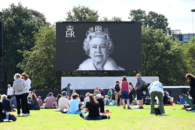 Mourners gather to watch the procession for the Lying-in State of Queen Elizabeth II at Hyde Park (Pic: Getty Images)