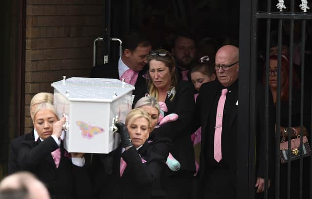 Olivia's mother Cheryl Korbel walks behind Olivia Pratt-Korbel's coffin as it is carried out of St Margaret Mary's Church in Knotty Ash, 